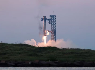 SpaceX's catch-landing method marks milestone in reusable rocket development for moon, Mars missions